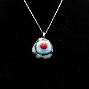 Jewelry - Sky blue and mahogany patterned pendant with red dot