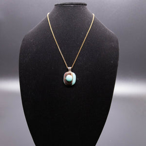 Jewelry - two toned light blue and brown round pendant