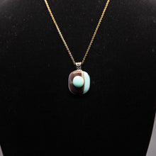 Load image into Gallery viewer, Jewelry - two toned light blue and brown round pendant
