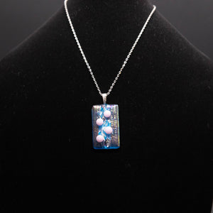 Jewelry - rectangular iridescent pendant with pink accent