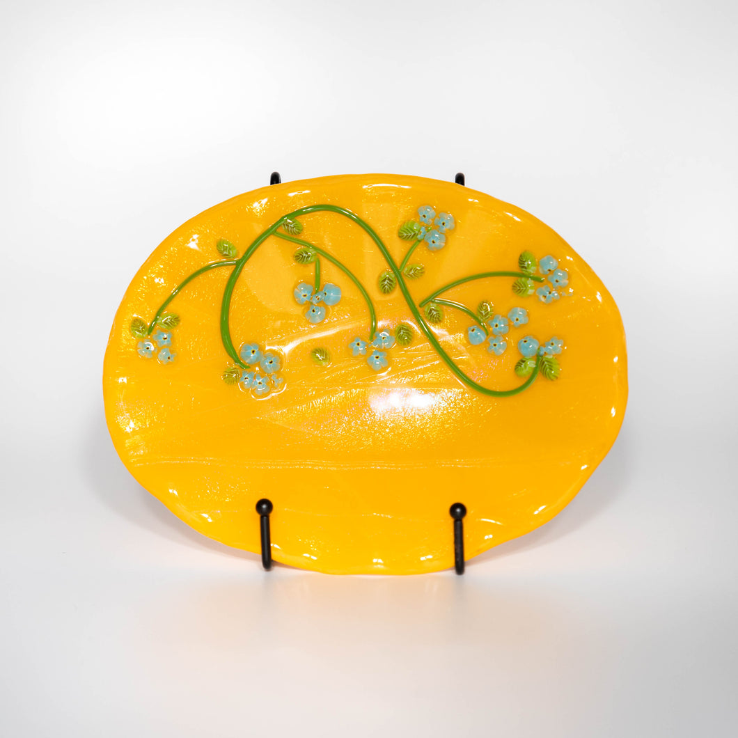 Bowl - Bright yellow oval dish with scalloped edge and blue flowers