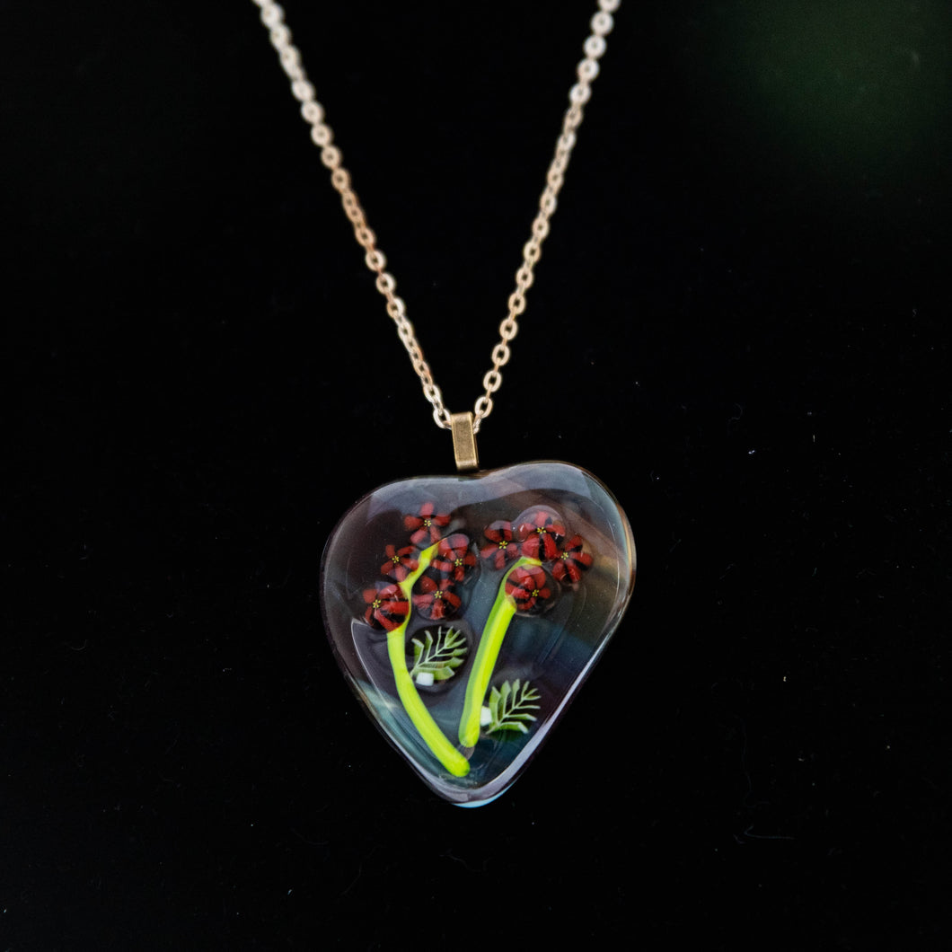Jewelry - Woodsy heart shaped pendant with red flowers