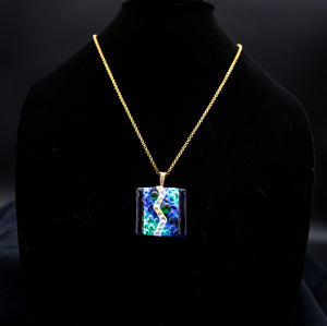 Jewelry - Iridescent blue and teal pendant